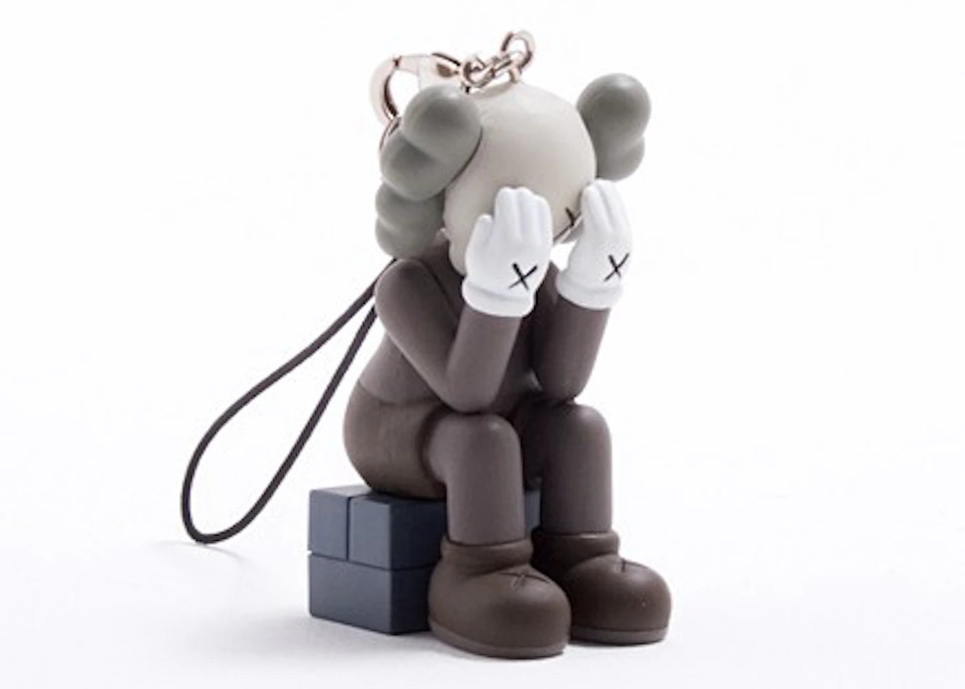 KAWS Passing Through Keychain Brown